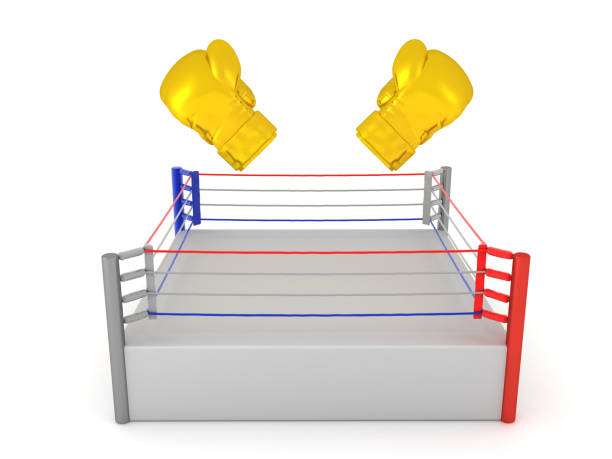 istock 3D Rendering of two tilted gold boxing gloves above a ring 2205709059