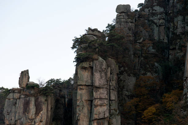istock cliff and mountain peak in autumn 2205712386