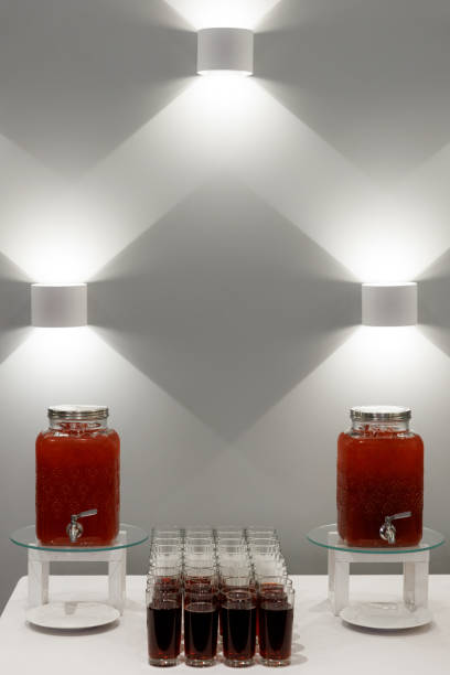 istock Fresh lemonade in a drink dispenser and glasses 2205712576