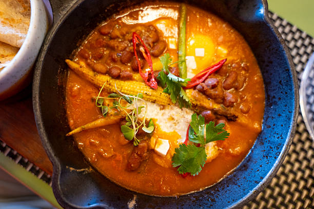 Hearty Vegetarian Chili in Cast Iron Skillet with Naan Bread
