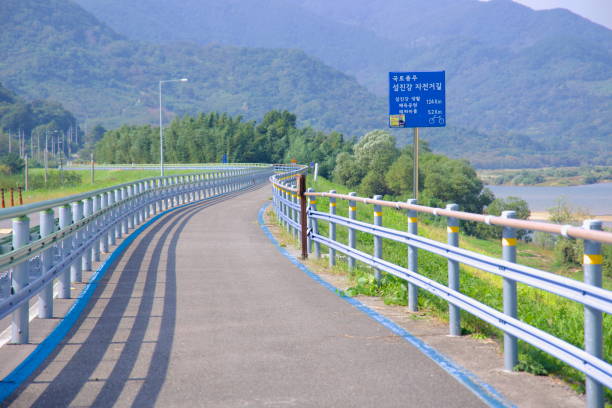 istock Seomjingang Bike Path Curving Along the Seomjin River 2205713471