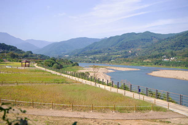istock Seomjingang Bike Path Overlooking the River and Mountains 2205713487
