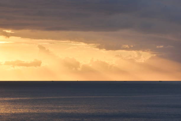 Dramatic beautiful light scenery of sunset over the ocean.