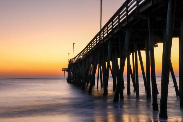 istock Sunrise at Virginia Beach shore 2205714295