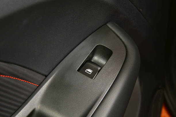 istock The button for raising the windows in the car 2205718212