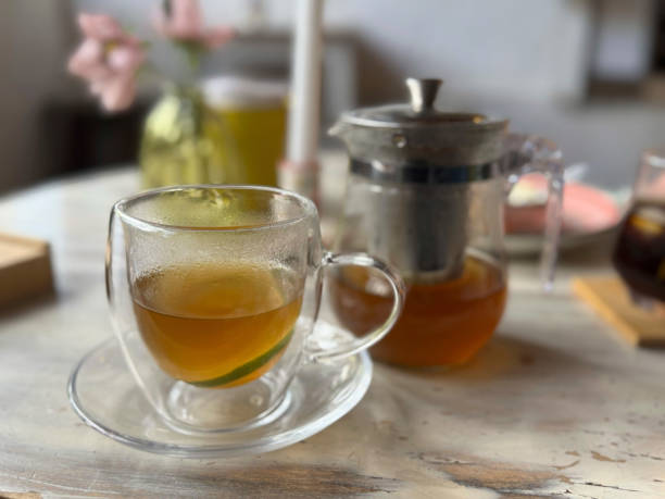 istock Hot lemon infusion in glass 2205718741