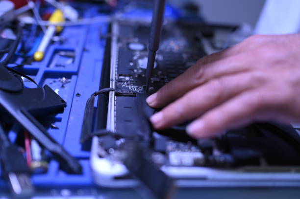 istock Repairing a laptop 2205718847