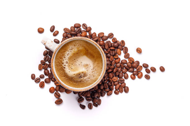 istock A steaming cup of freshly brewed coffee surrounded by rich, aromatic roasted coffee beans 2205719365