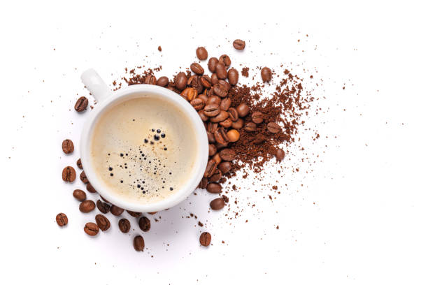 istock A steaming cup of freshly brewed coffee surrounded by rich, aromatic roasted coffee beans 2205719376