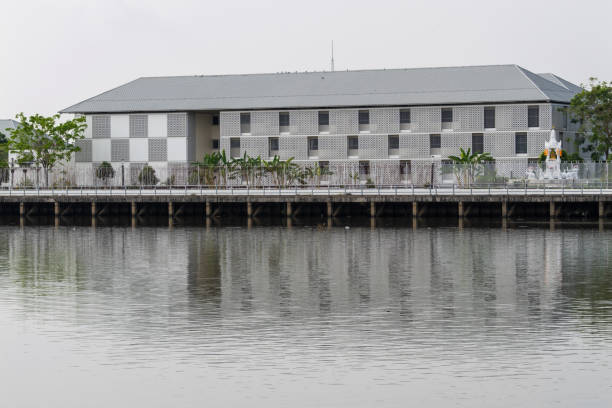 istock Modern architecture reflected in tranquil waters urban landscape calm environment 2205719870