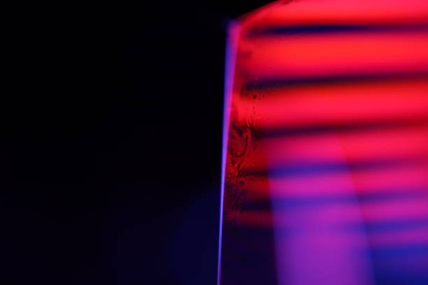 istock Red and blue reflection of the liquid, scientific abstraction 2205719897