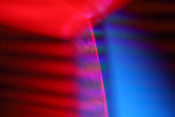 istock Red and blue reflection of the liquid, scientific abstraction 2205720019