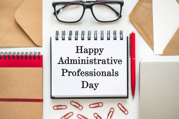 istock Happy Administrative Professionals Day. Notepad with congratulatory inscriptions 2205722972