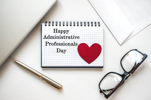 istock Happy Administrative Professionals Day. Notepad with congratulatory inscriptions 2205723004