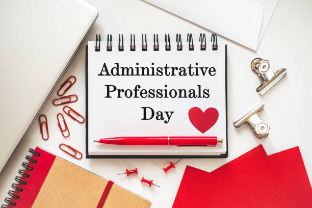 istock Happy Administrative Professionals Day. Notepad with congratulatory inscriptions 2205723020