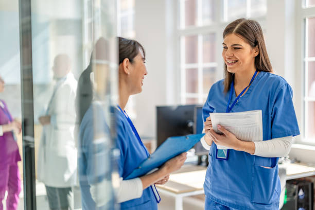 istock Healthcare workers collaborating in a modern hospital setting while discussing patient care and medical strategies 2205726108