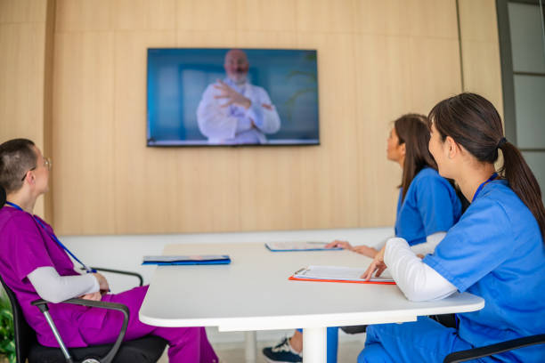 istock Healthcare workers collaborating in a modern hospital setting while discussing patient care strategies via video call 2205726471