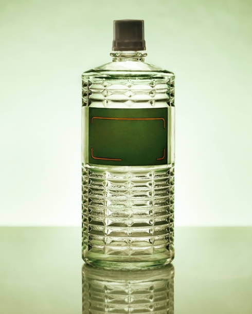 Antique vintage apothecary green glass bottle isolated on white background