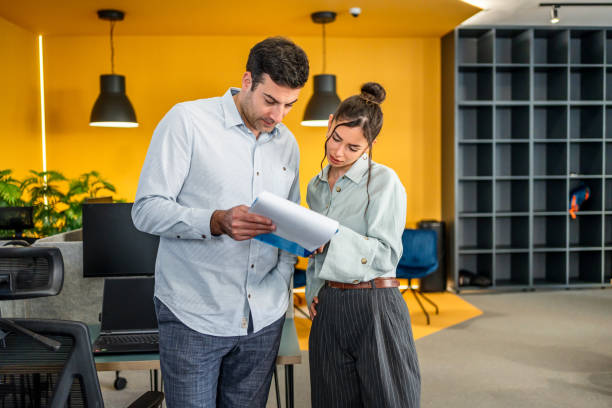 istock Coworkers working on project together 2205731031