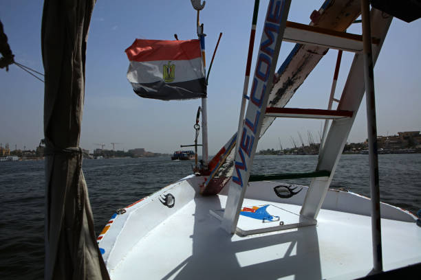 Upper Egypt - Esna. It's a special event to anchor at the Nile floodgate of Esna. As soon as the Nile cruises have to wait, they are immediately  surrounded by many boats with flying traders. The traders try to sell their goods as souvenir to the tourists. This is a key source for creating wealth for the people in this region.
