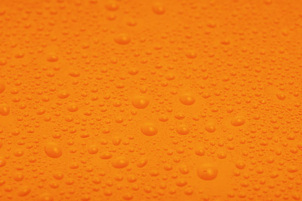 abstract background fall, glass drops autumn yellow leaves wet october weather.