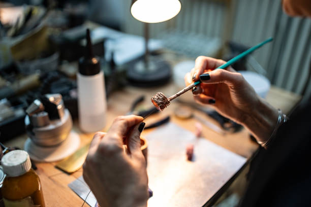 istock Crafting a Jewelry Item in a Well-Organized Artisan Workshop 2205737265
