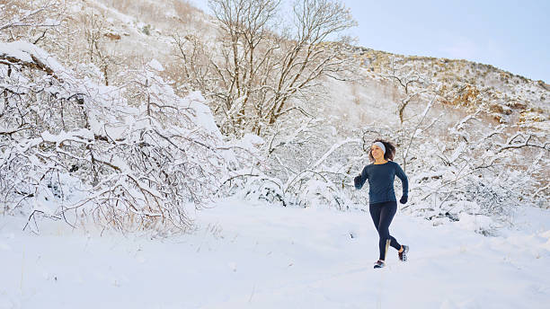 istock Woman on a Run in Winter 2205737332