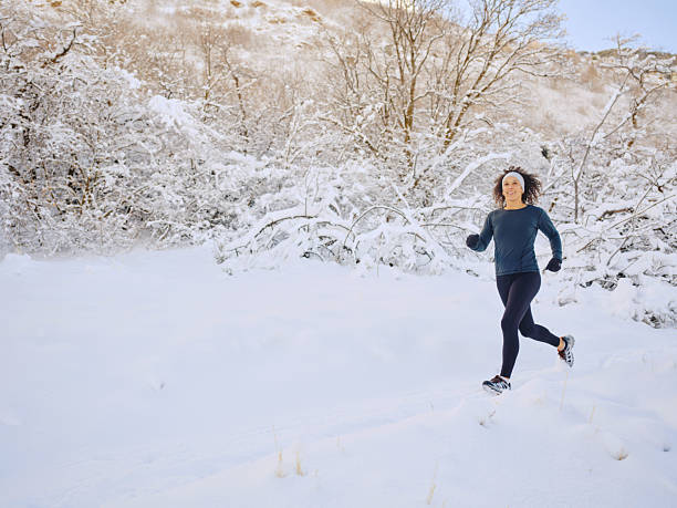 istock Woman on a Run in Winter 2205737392