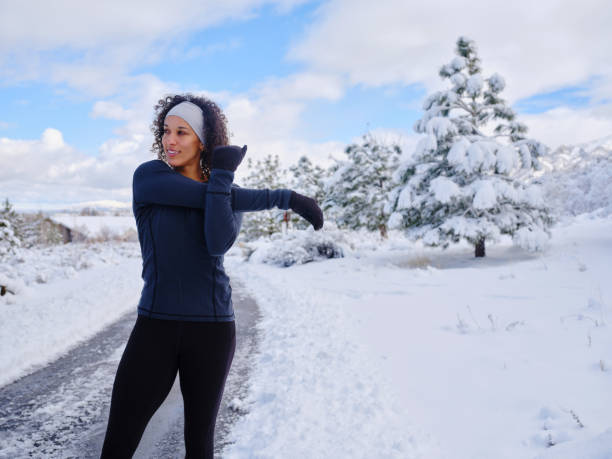 istock Woman on a Run in Winter 2205737453