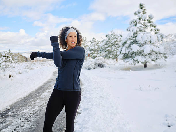 istock Woman on a Run in Winter 2205737456