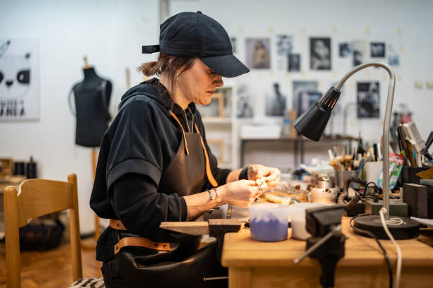 istock Jewelry Artisan Working Intently on Craft in a Workshop Environment 2205737771