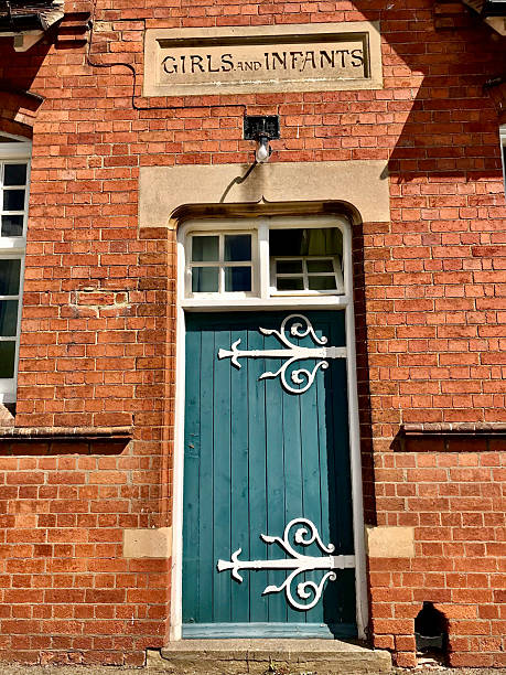istock Door To Former Primary School, England 2205740623