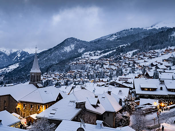 istock Winter view of the old town in Chatel with cloudy sky 2205743640