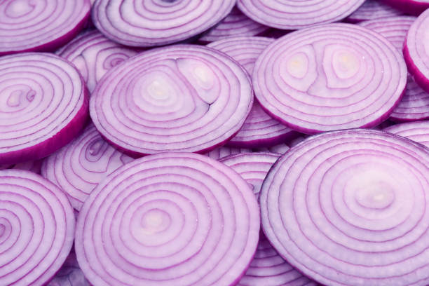 Onion slices as a background. Top view.