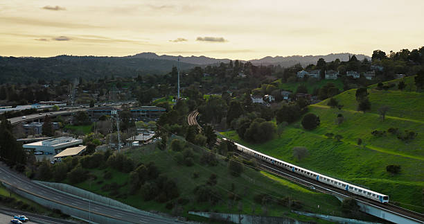 istock Subway Train Passing over Interstate 680 in Walnut Creek, California - Aerial Shot 2205755855