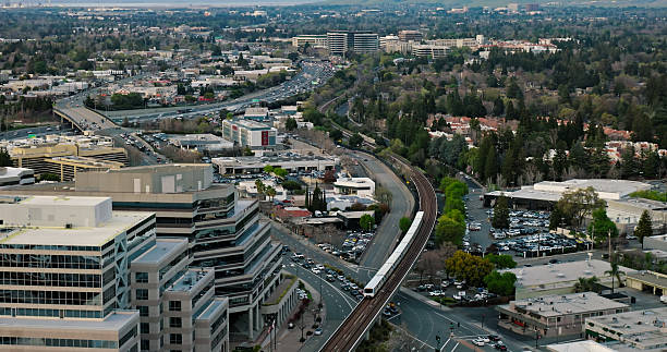 istock Subway Train Moving Through Walnut Creek, California - Aerial 2205756050