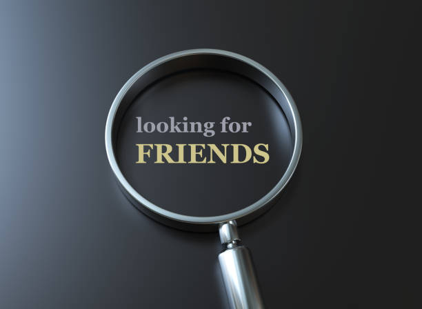 istock Looking for Friends Sign on Magnifying glass 2205756117