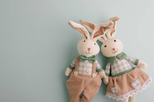 istock Easter  rabbits on green background. Top view 2205756347