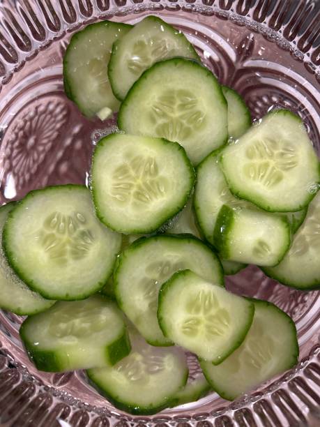 istock Fresh Cucumber Slices in Water 2205766293
