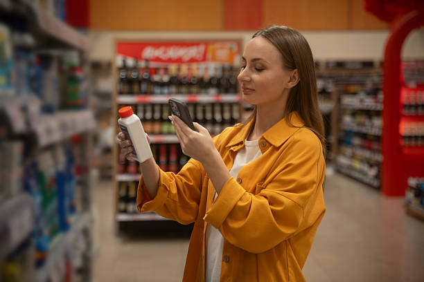 istock Exploring household chemicals while scanning products in a retail store during daytime shopping 2205767694