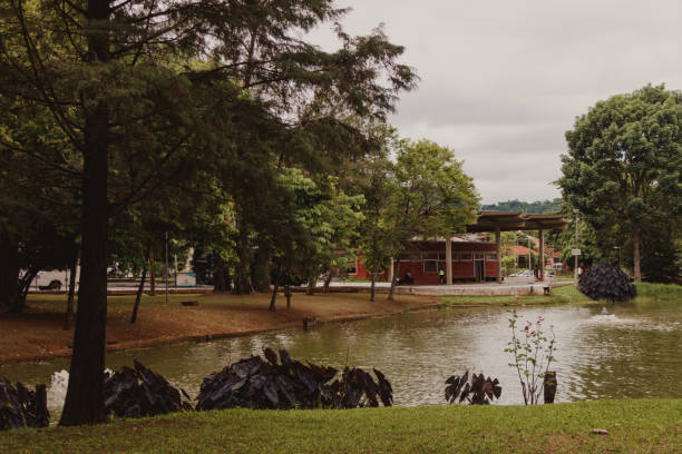 istock Scenic Park View with Pond and Pavilion 2205767812
