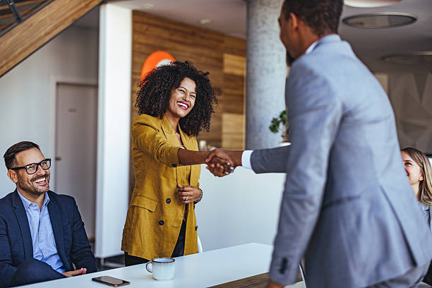 istock Professional Team Engaged in a Business Meeting with Handshake Interaction 2205768269