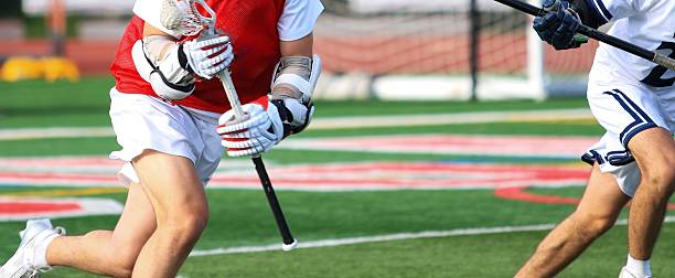 istock Close up of Lacrosse Players Compete during an game 2205769748