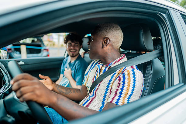 istock Friends talking in the car 2205770452