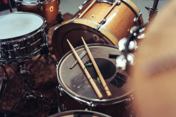 istock Close-up of a drum set with drumsticks 2205772338