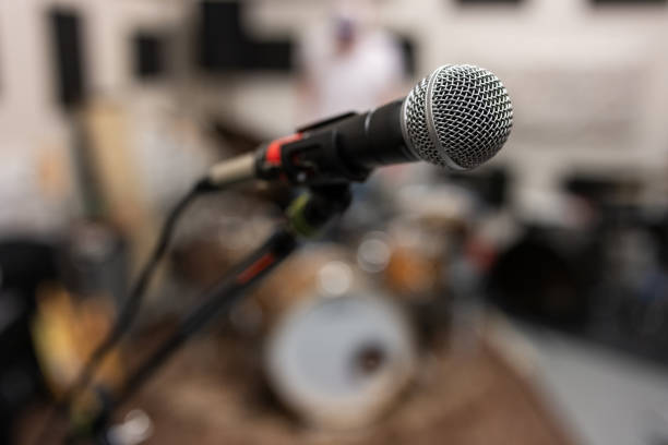 istock Close-up of a microphone in a rehearsal studio 2205772355