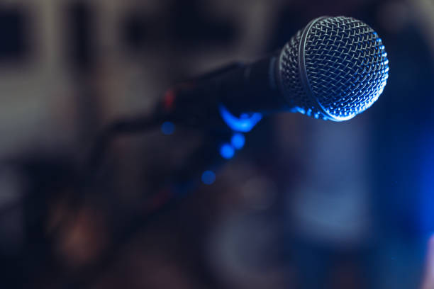 istock Close-up of a microphone in a rehearsal studio 2205772389