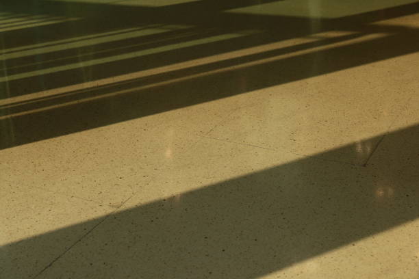 istock This piece features an exploration of Abstract Shadow Patterns as they appear on a Floor 2205772449