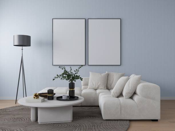 istock Living room with grey wall, two blank vertical frames and interior decoration 2205778493