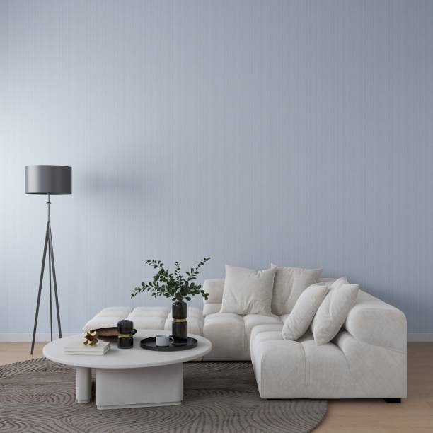 istock Living room with grey wall, sofa, decorated table and lamp 2205778494